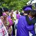 Kierra Roberson embraces her big brother Nahjee Whitsett while his aunt, Latrina Barden, cries after Commencement at the Convocation Center at Eastern Michigan University on Tuesday, June 4. This is the 164th and final graduating class for Ypsilanti High School. Daniel Brenner I AnnArbor.com